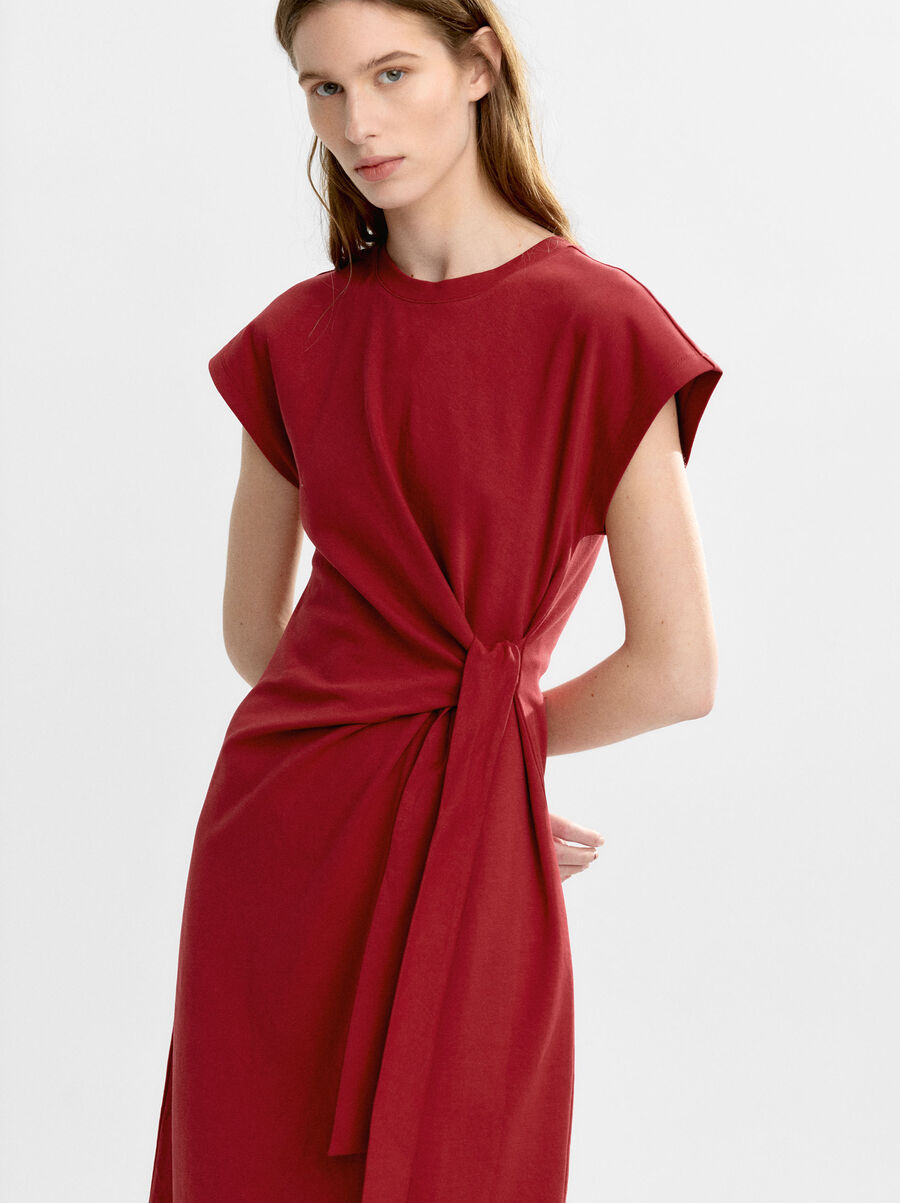 Draped dress with bow