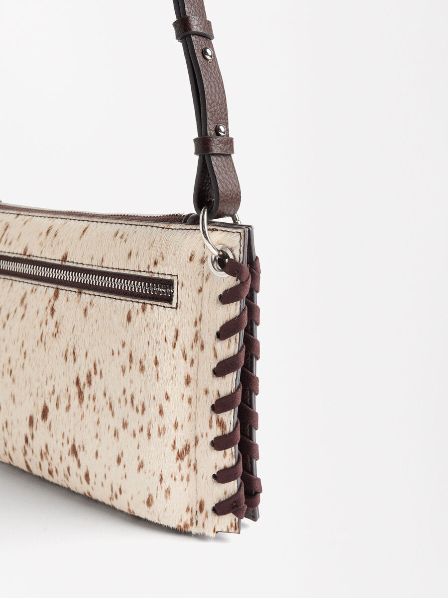 Leather crossbody bag with exterior pocket