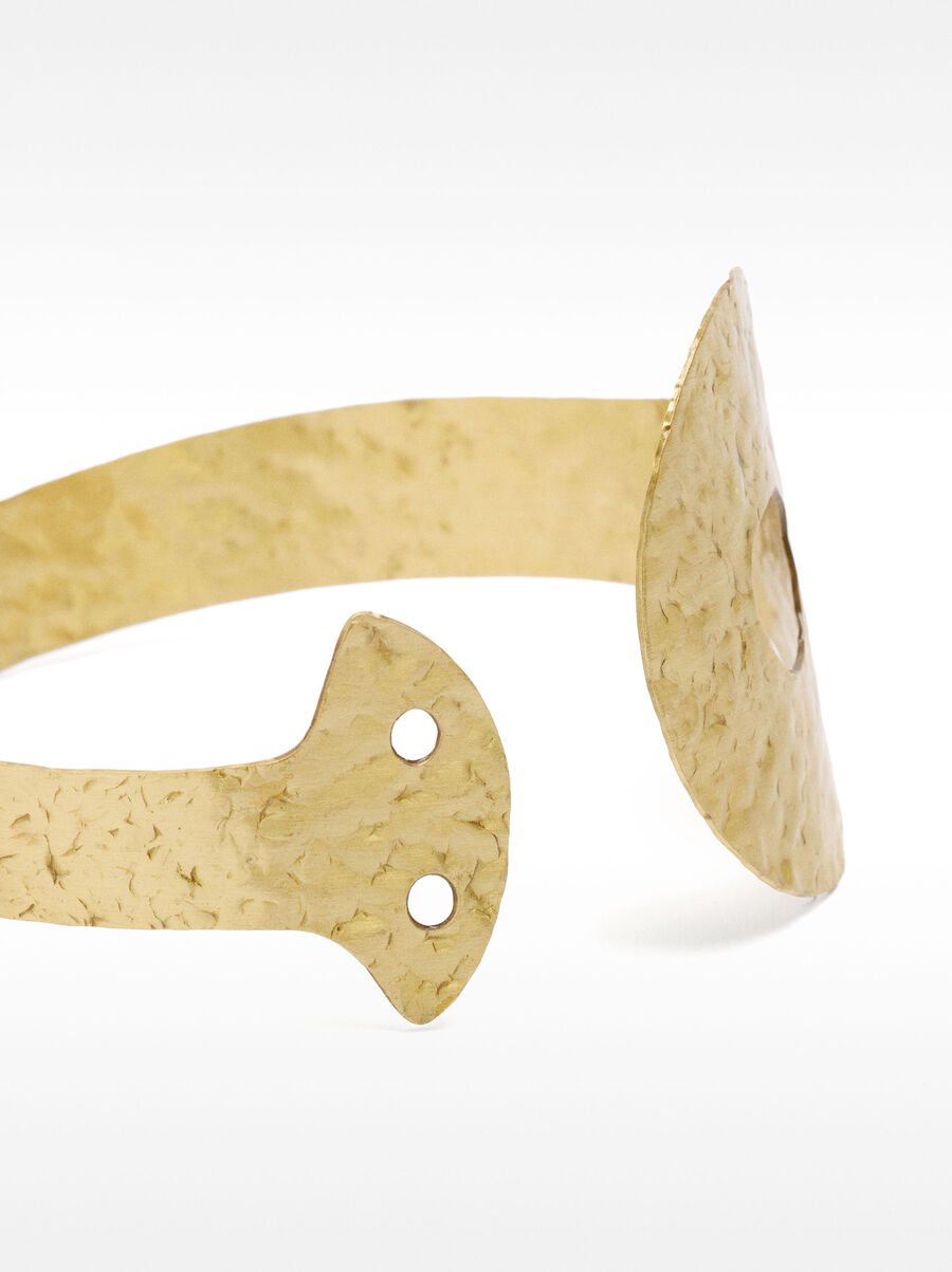 Open bracelet with brass