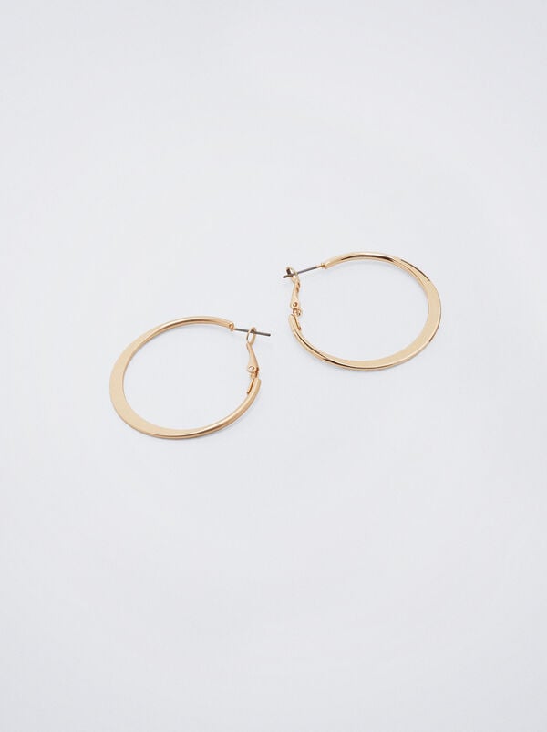Set of golden hoop earrings