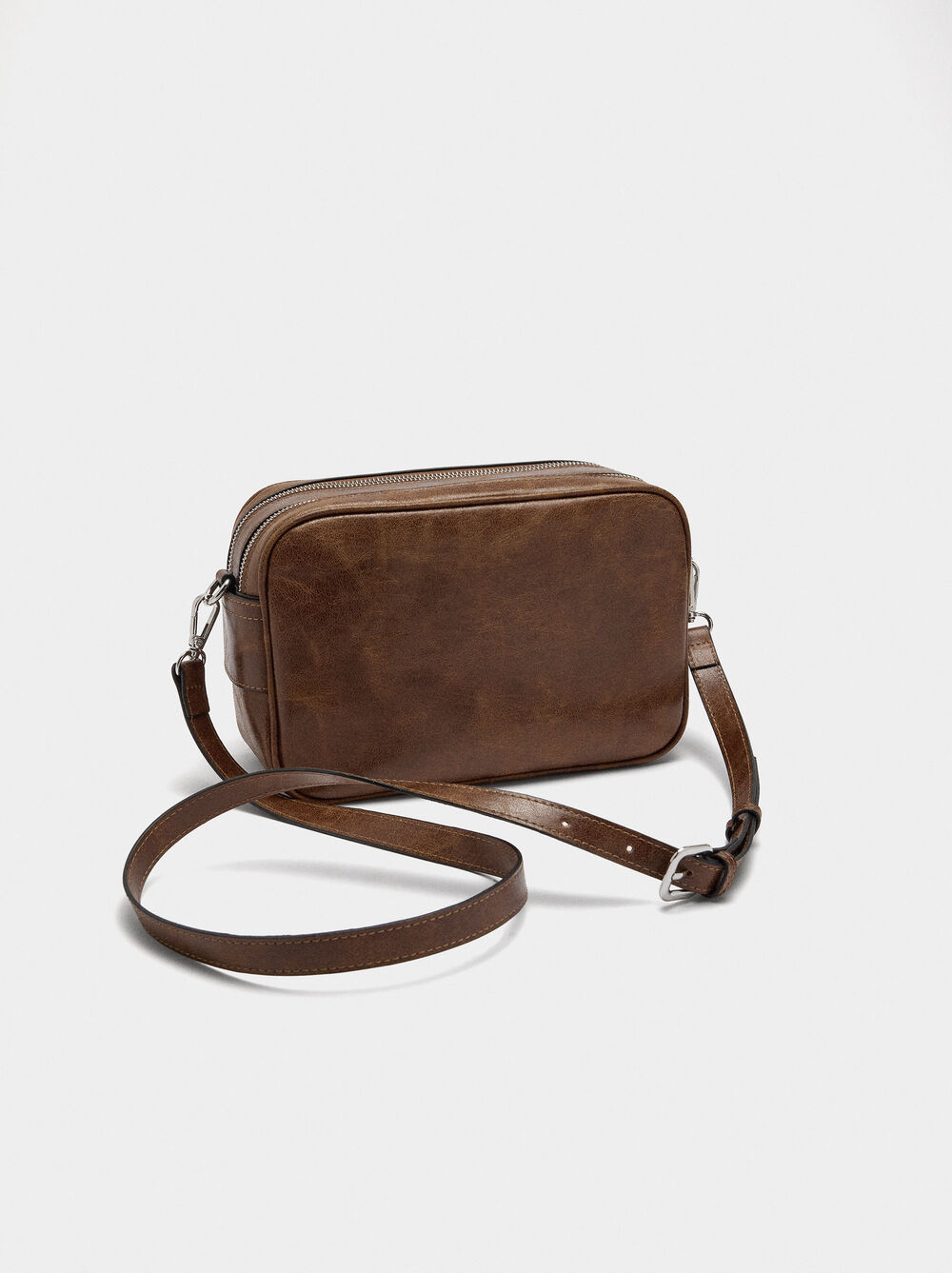 Sac bandoulière en effet vieilli