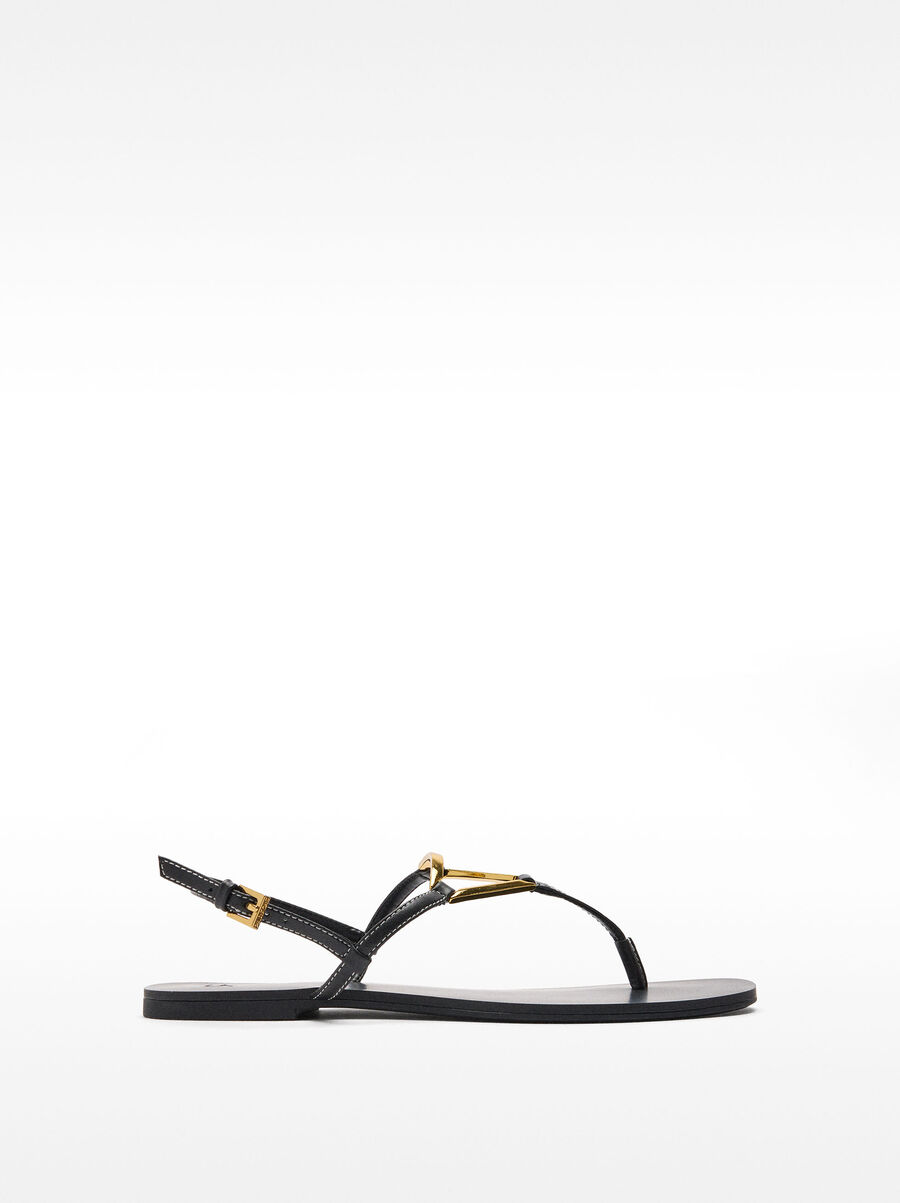 Flat sandals with metallic detail straps