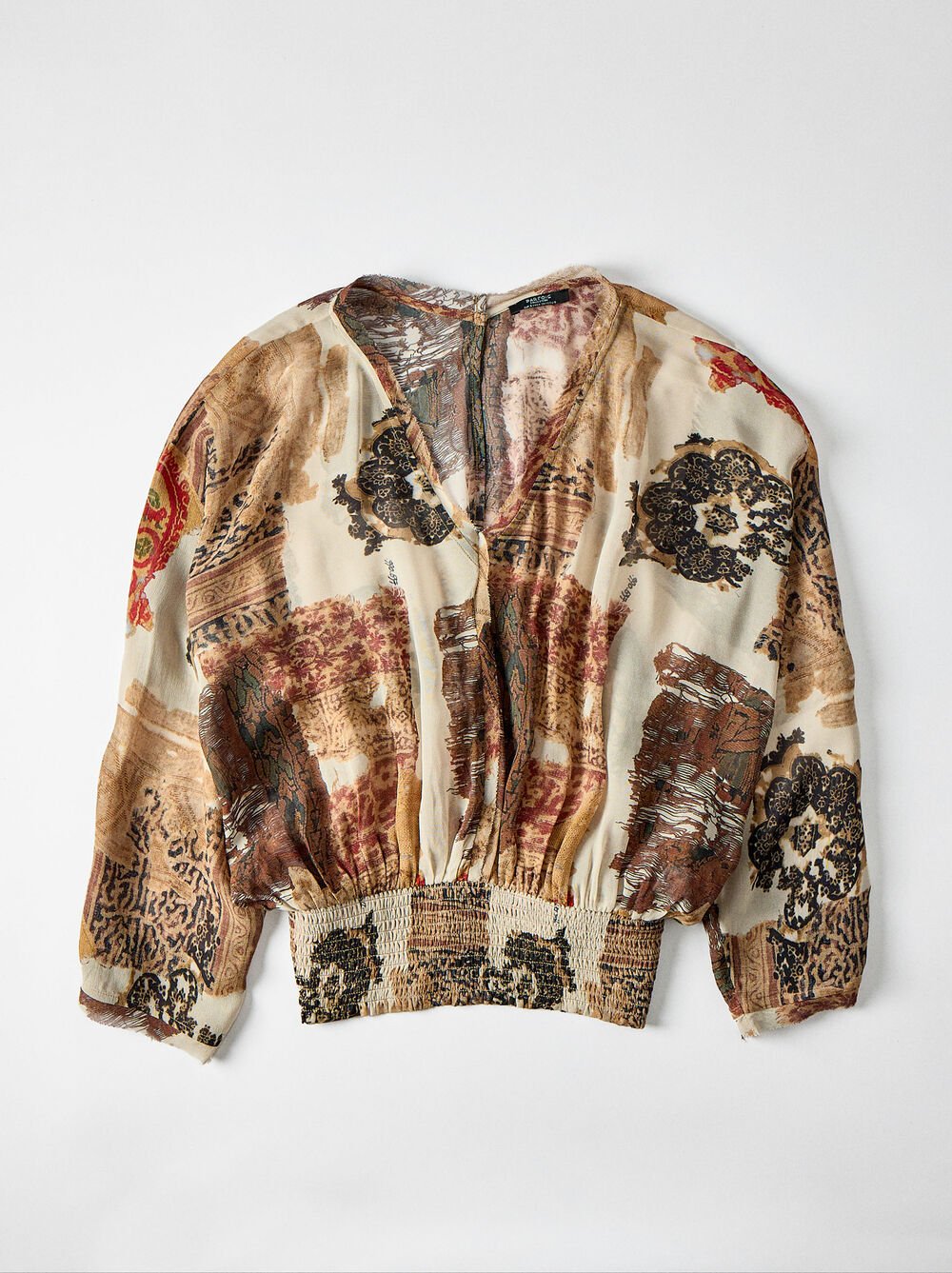 Blouse with semi-transparent print