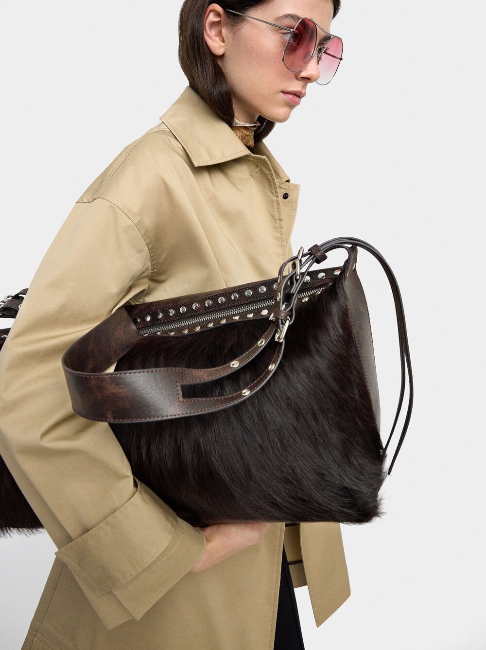 Bag with leather and studs details