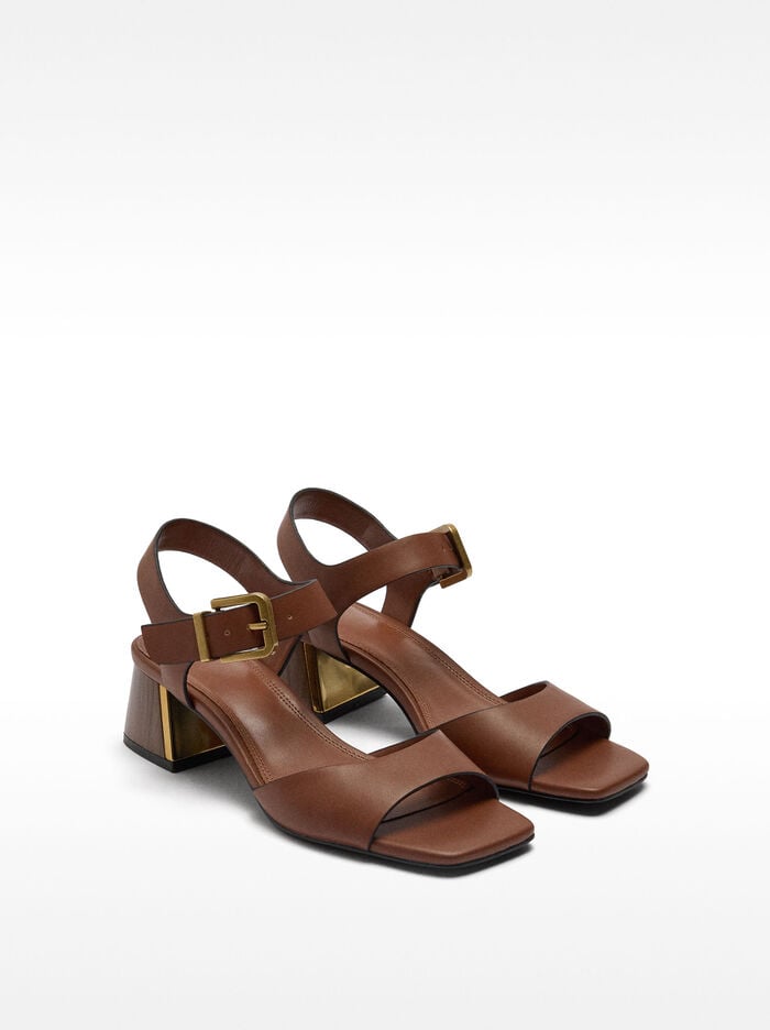 Heeled sandal with strap