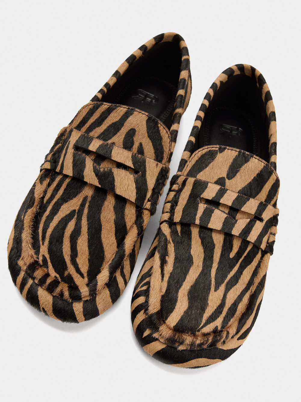 Animal print leather moccasins