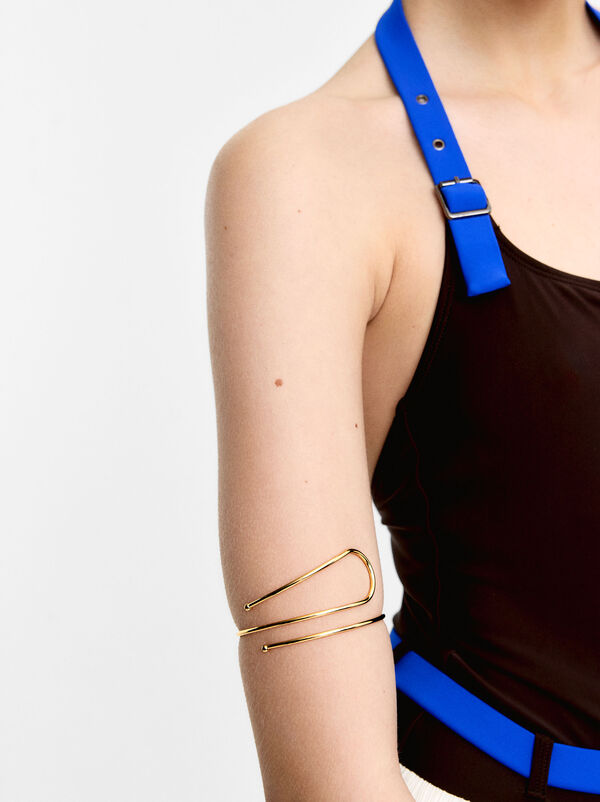 Crossed rigid bracelet