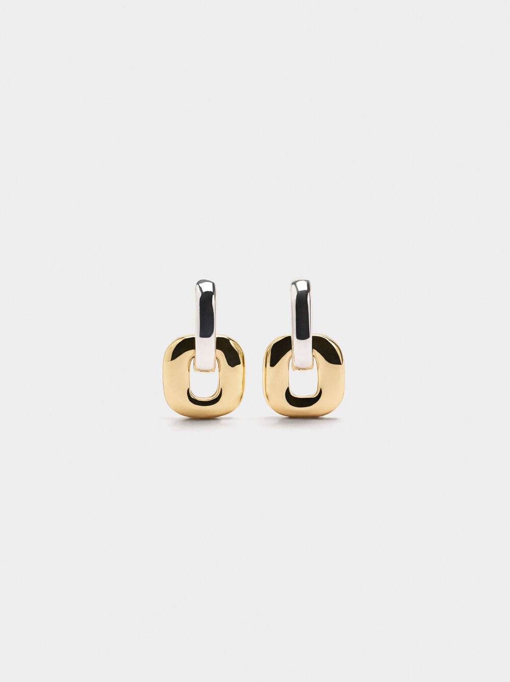 Crossed bicolor hoop earrings