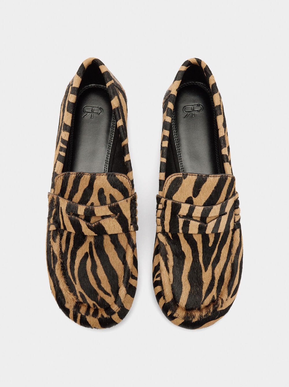 Animal print leather moccasins
