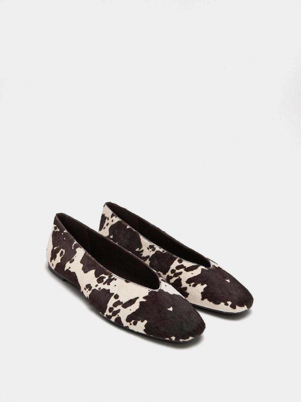 Leather ballet flats printed with animal print