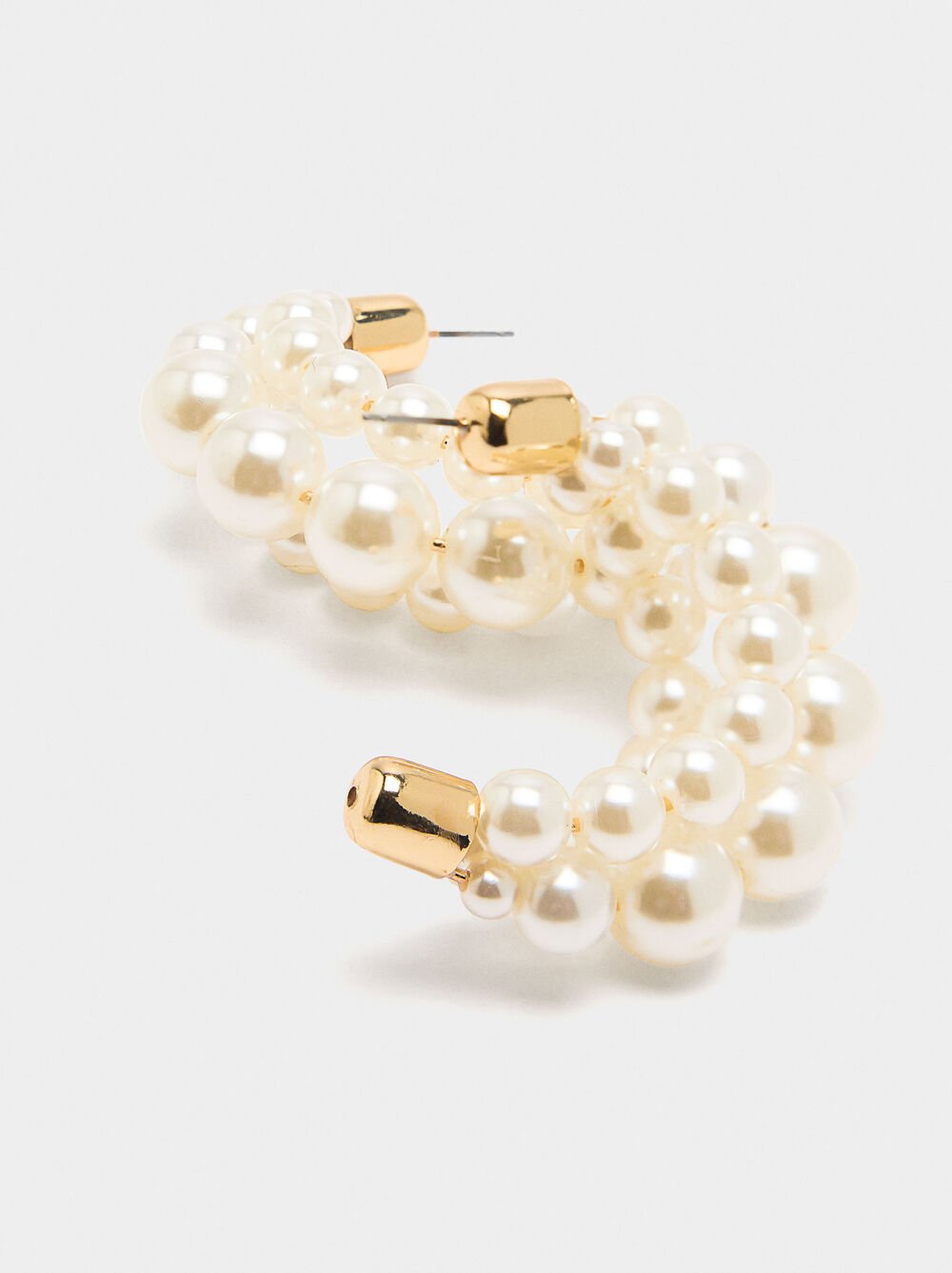 Open hoop earrings with pearls