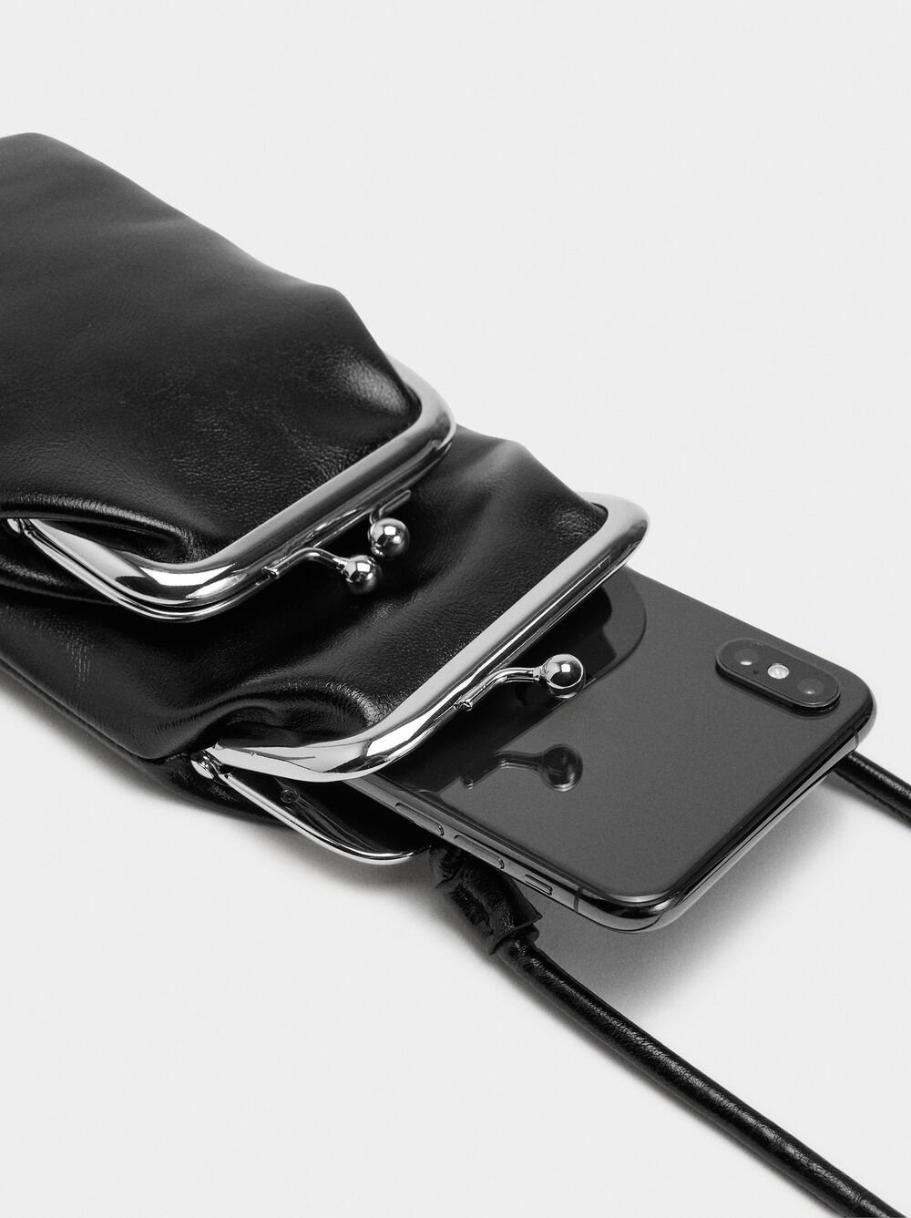 Mobile phone bag with kiss-lock closure