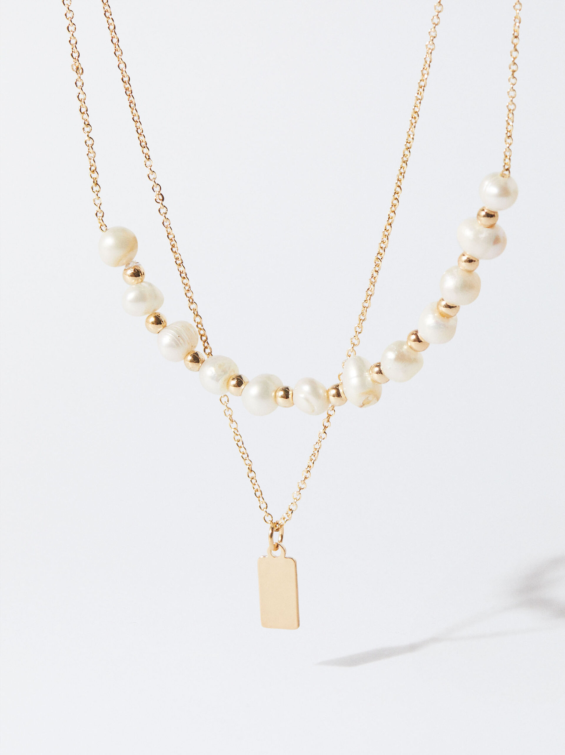 Collar dorado con perlas image number 2.0