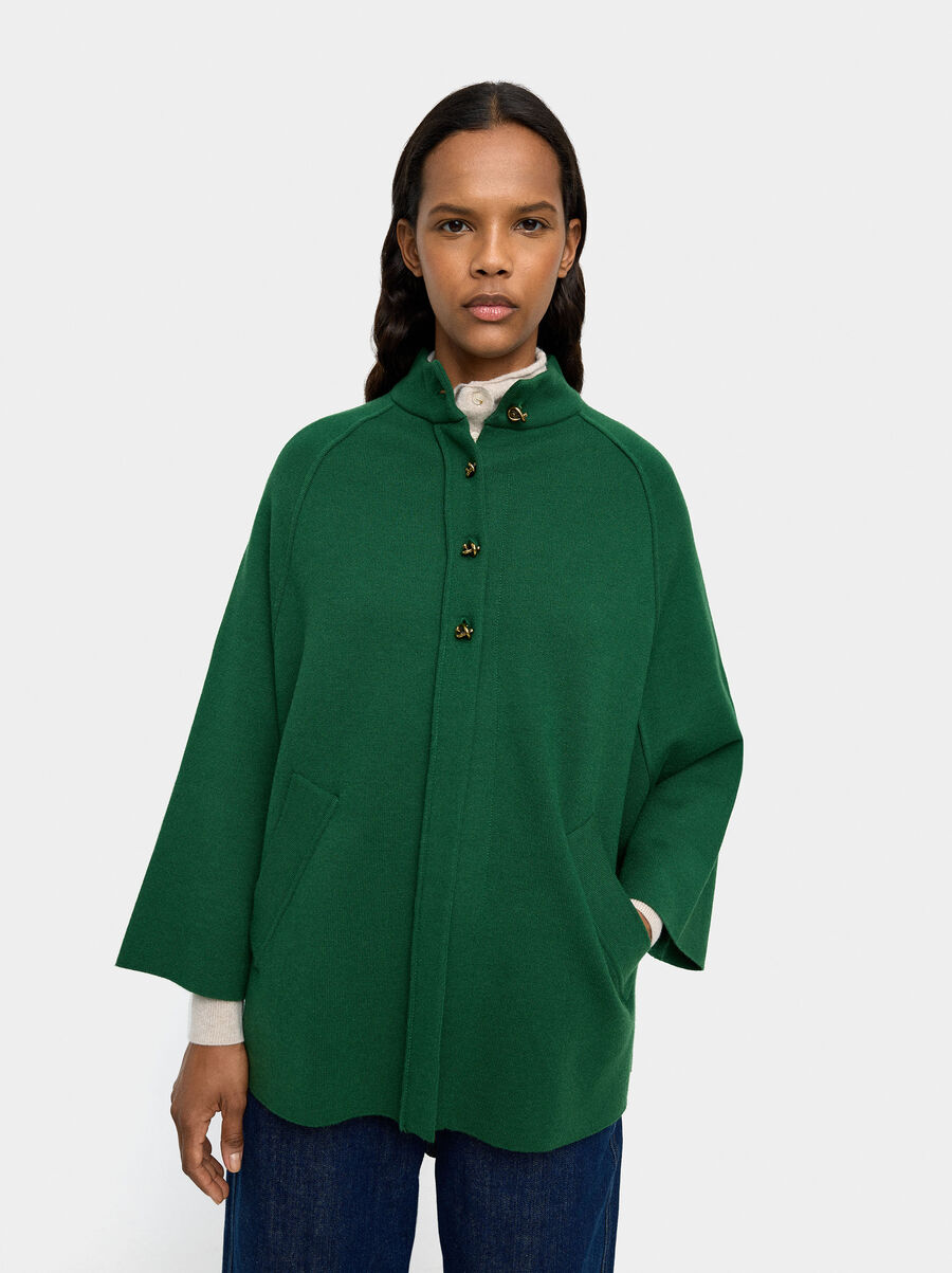 Knit mesh poncho with high neck