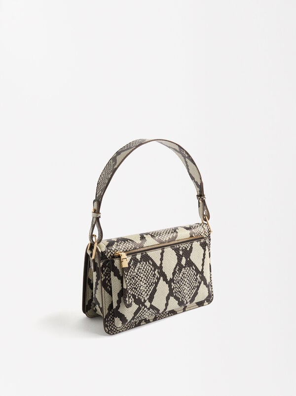 Shoulder bag with animal print and engraving