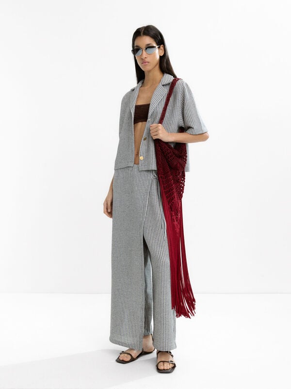 Striped crossover trousers