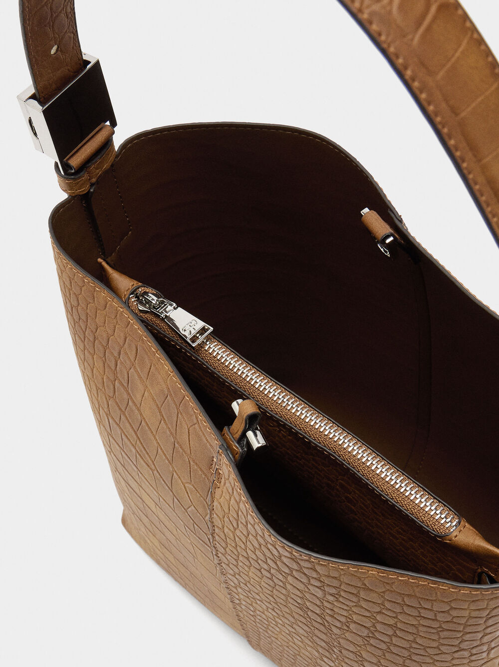 Shoulder bag with animal embossing