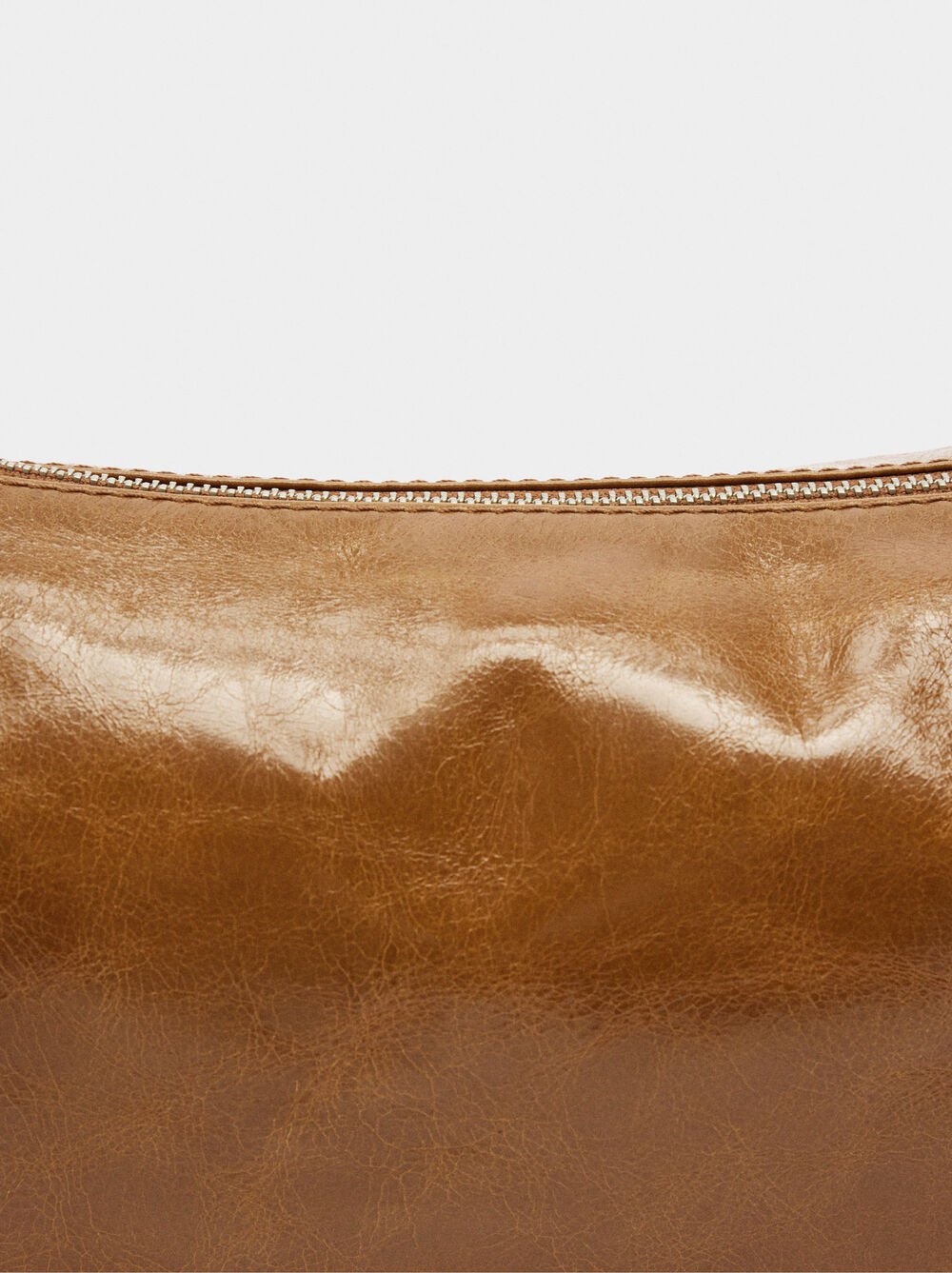 Sac hobo en cuir avec clous