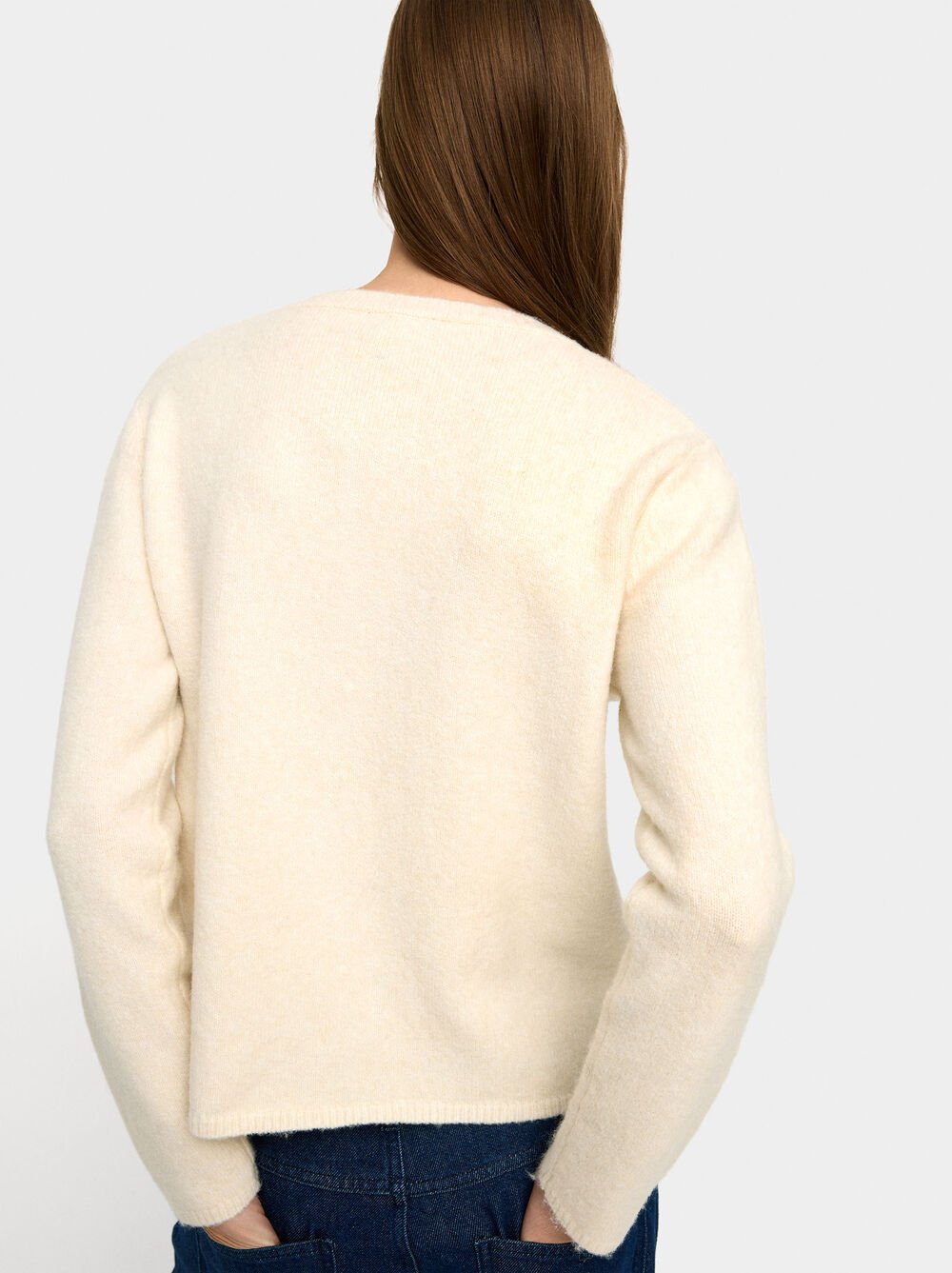 Knitted cardigan with ruffles