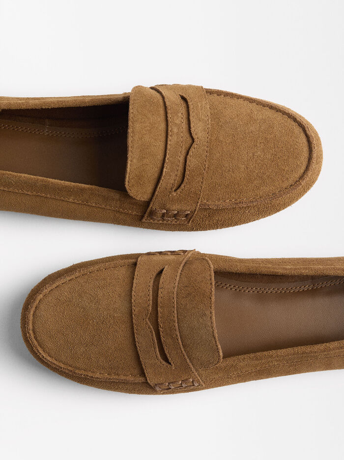 Mocassins de pell amb repunt