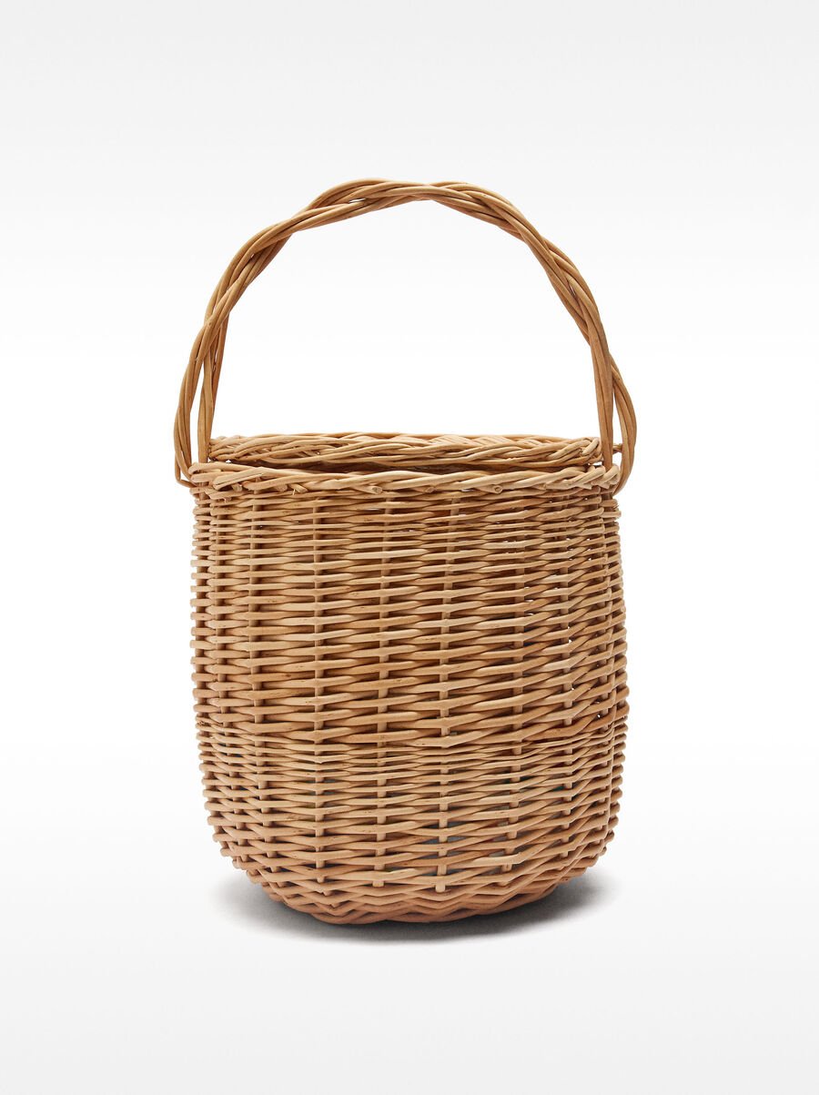 Rounded rattan handbag