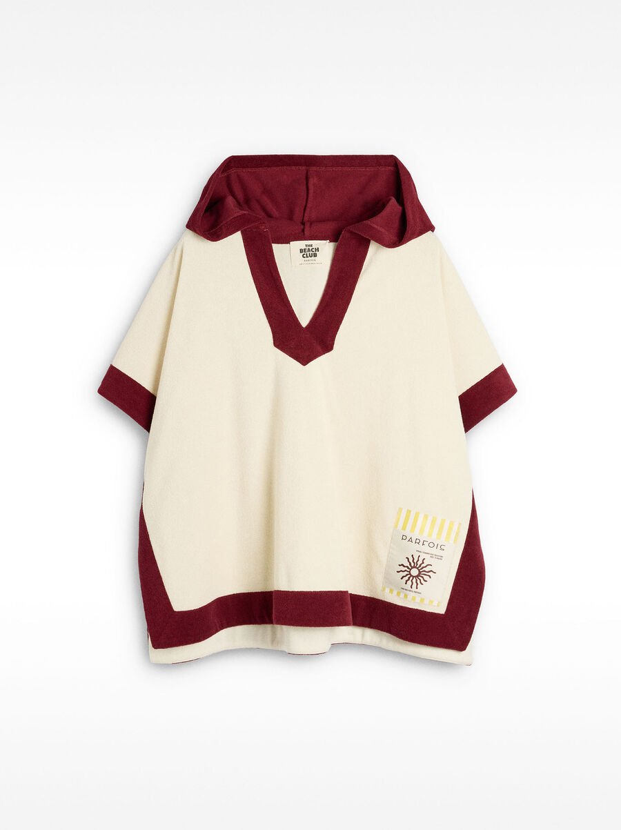 Cotton poncho with contrasting colors
