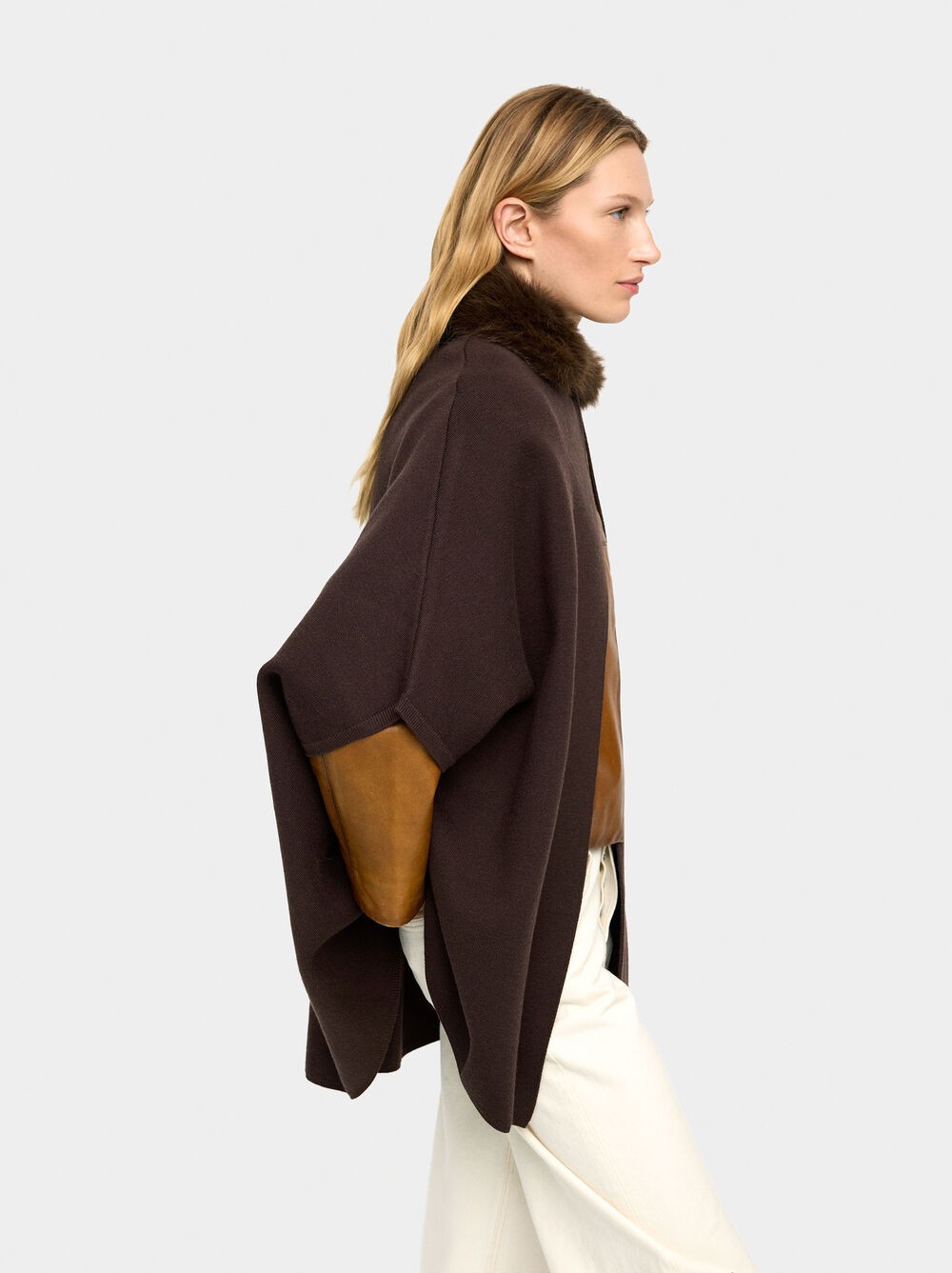 Knit poncho with fur-effect collar