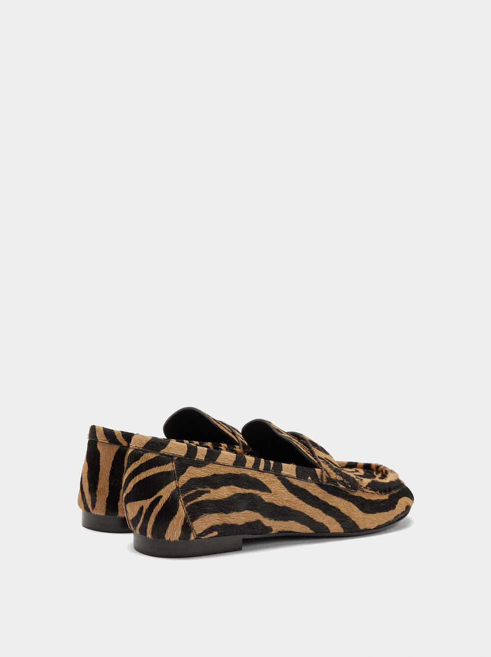 Animal print leather moccasins