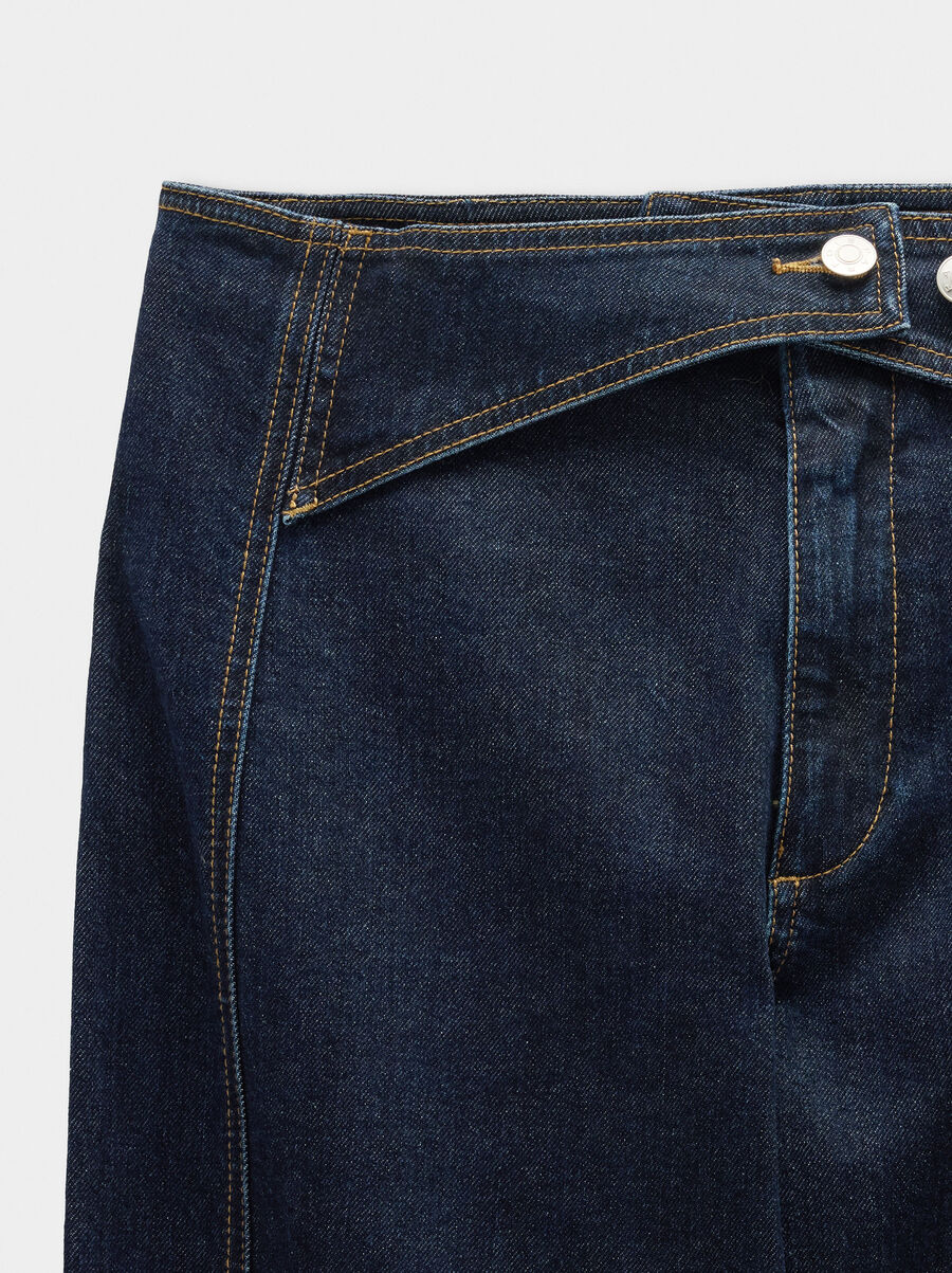 Denim trousers with overlap closure