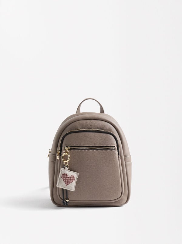 Backpack with heart pendant