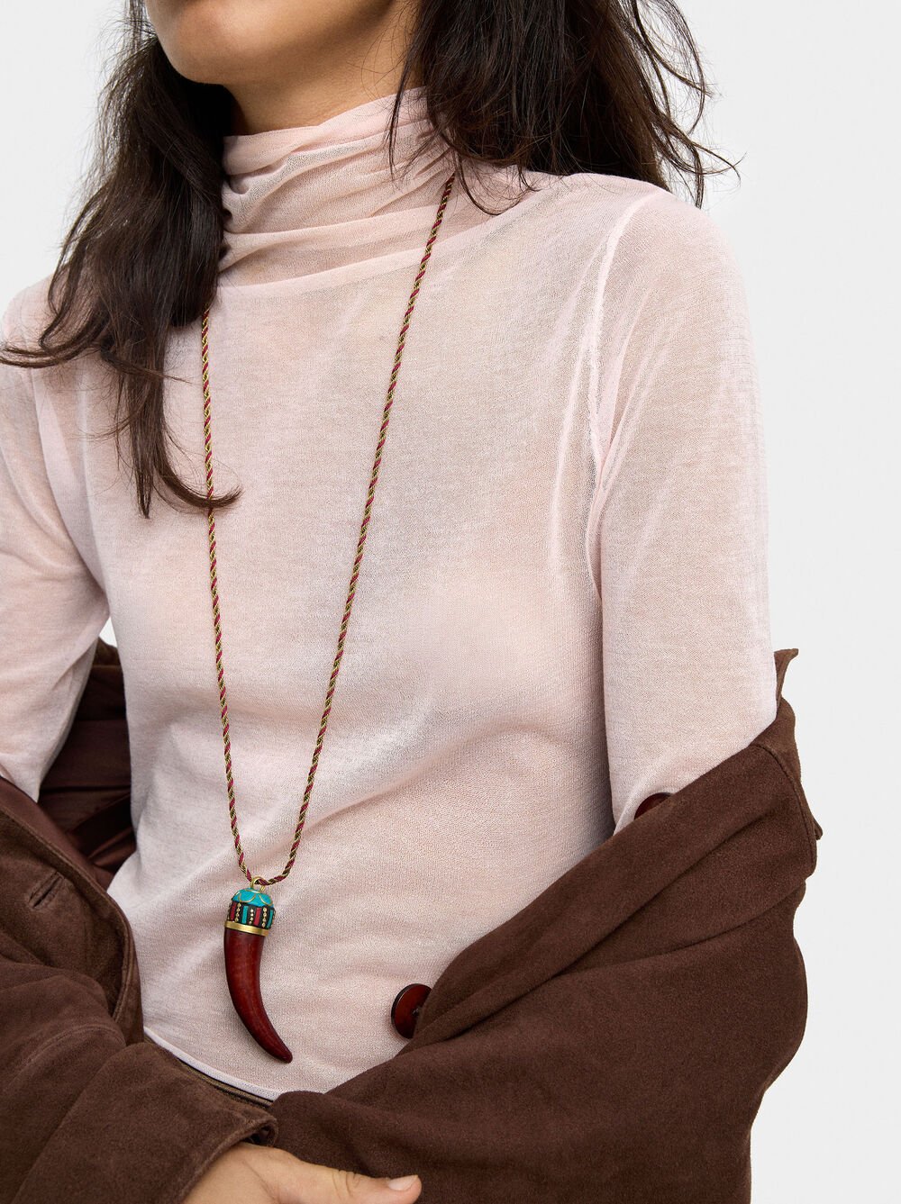 Long necklace with ethnic pendant