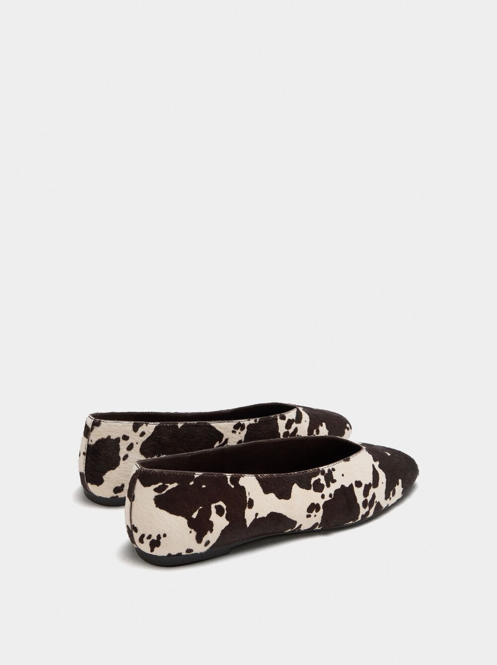 Leather ballet flats printed with animal print