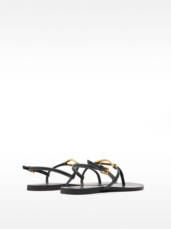 Flat sandals with metallic detail straps