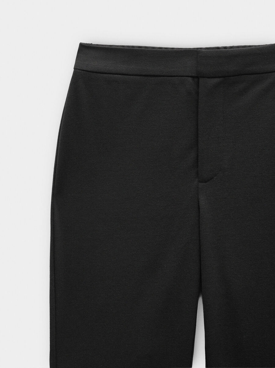 Pantalón flare liso