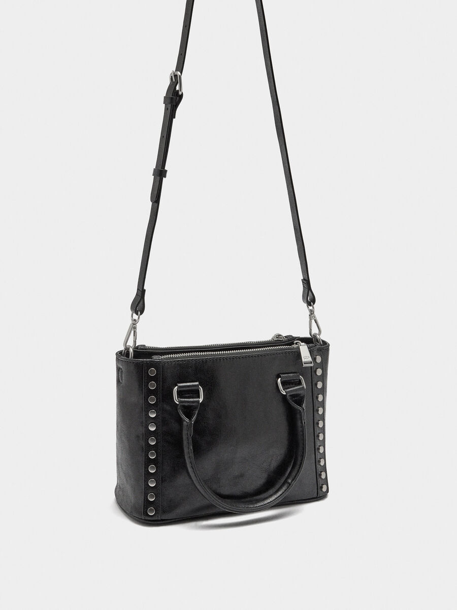 Bolso tote con tachuelas