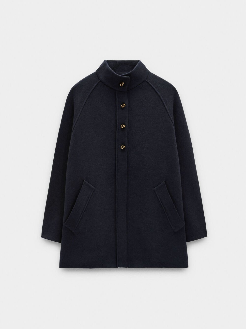 Poncho de malha com gola alta