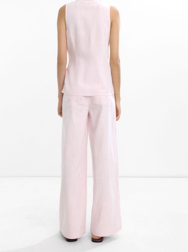 Top with embroidery and knot
