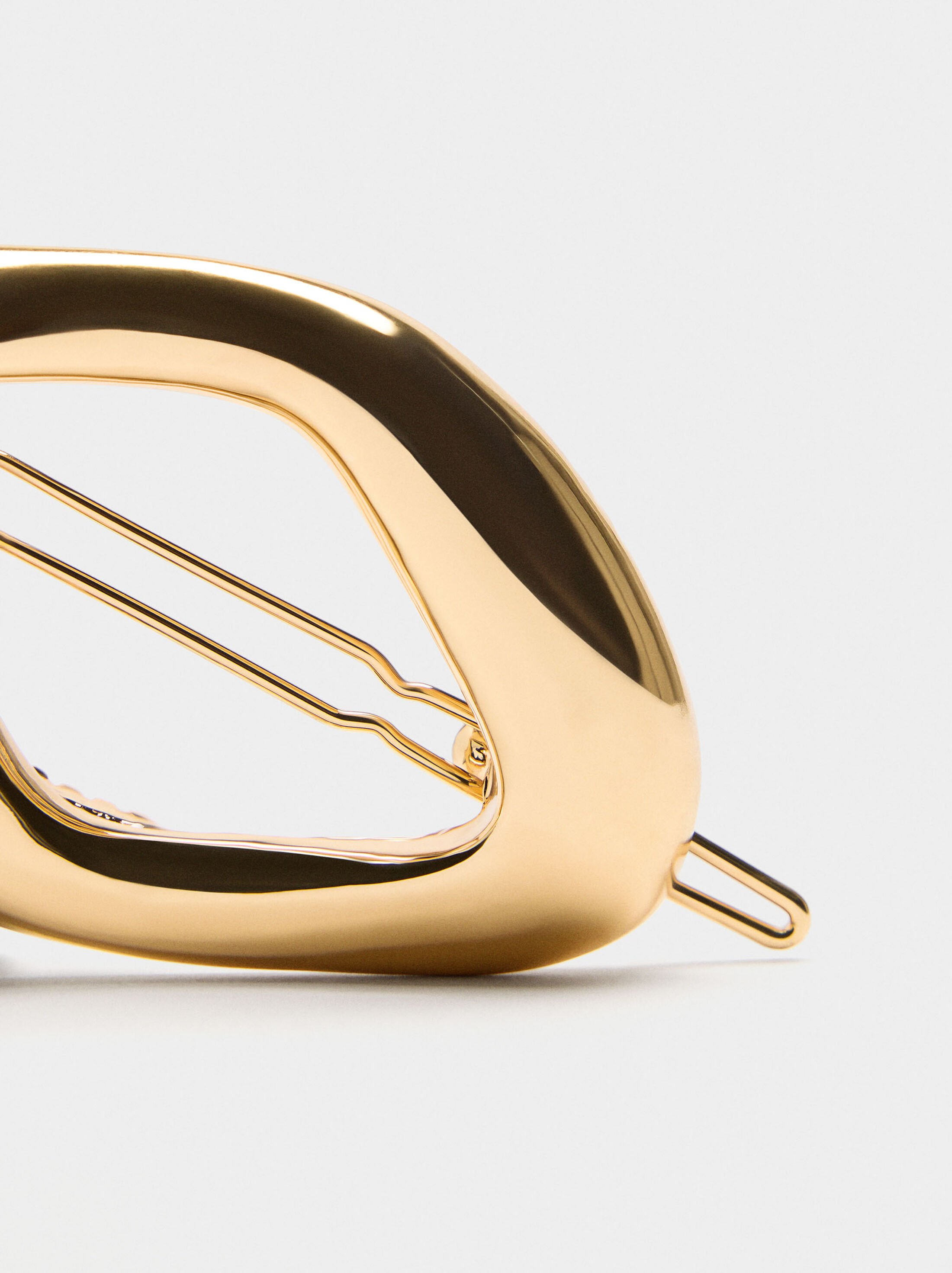 Oval gold hair clip image number 1.0