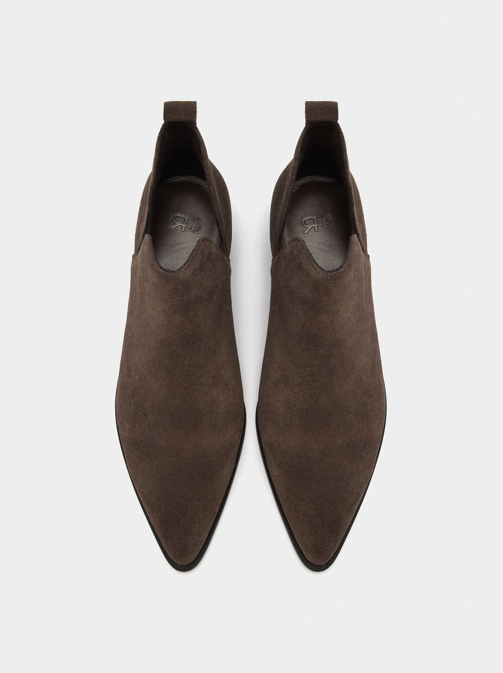 Botes curtes de cuir cowboy amb obertures