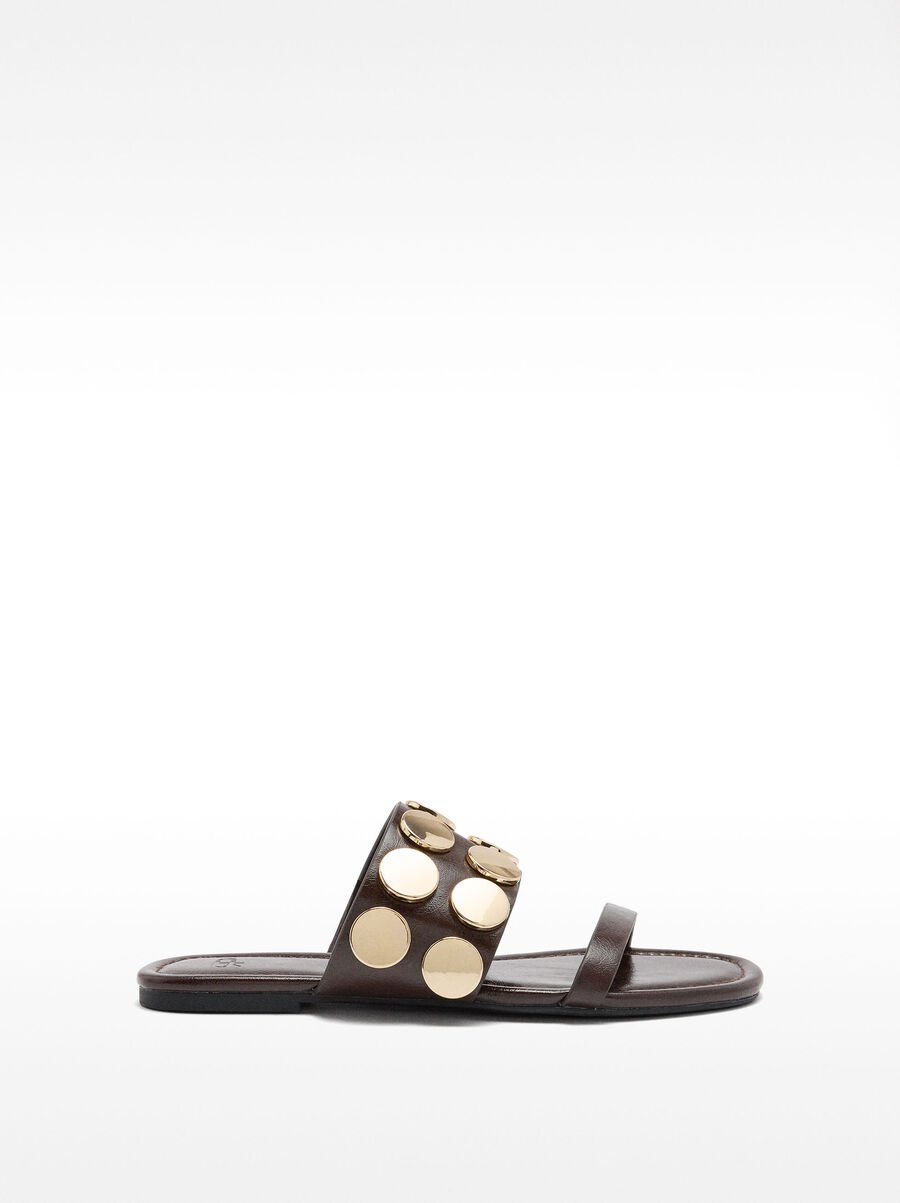 Flat sandals with metallic details