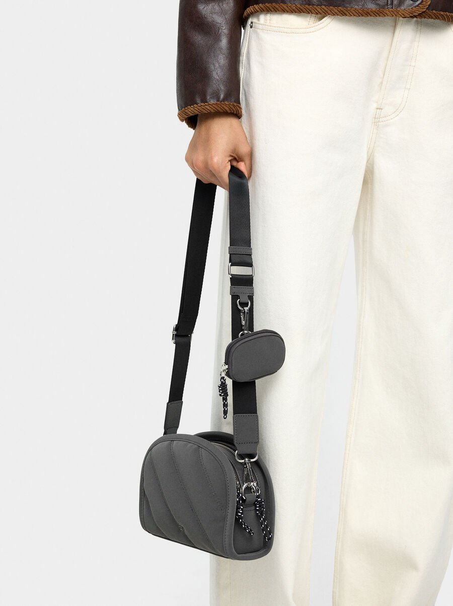 Crossbody bag with soft texture and pendant