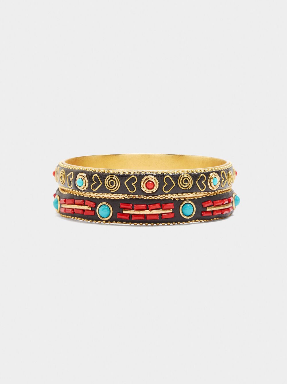 Set of rigid bracelets with colour details