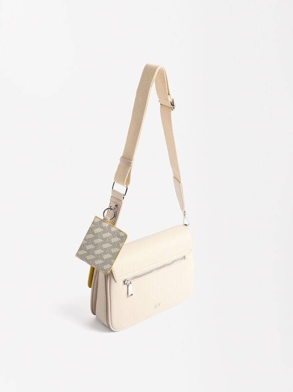 Crossbag with flap closure