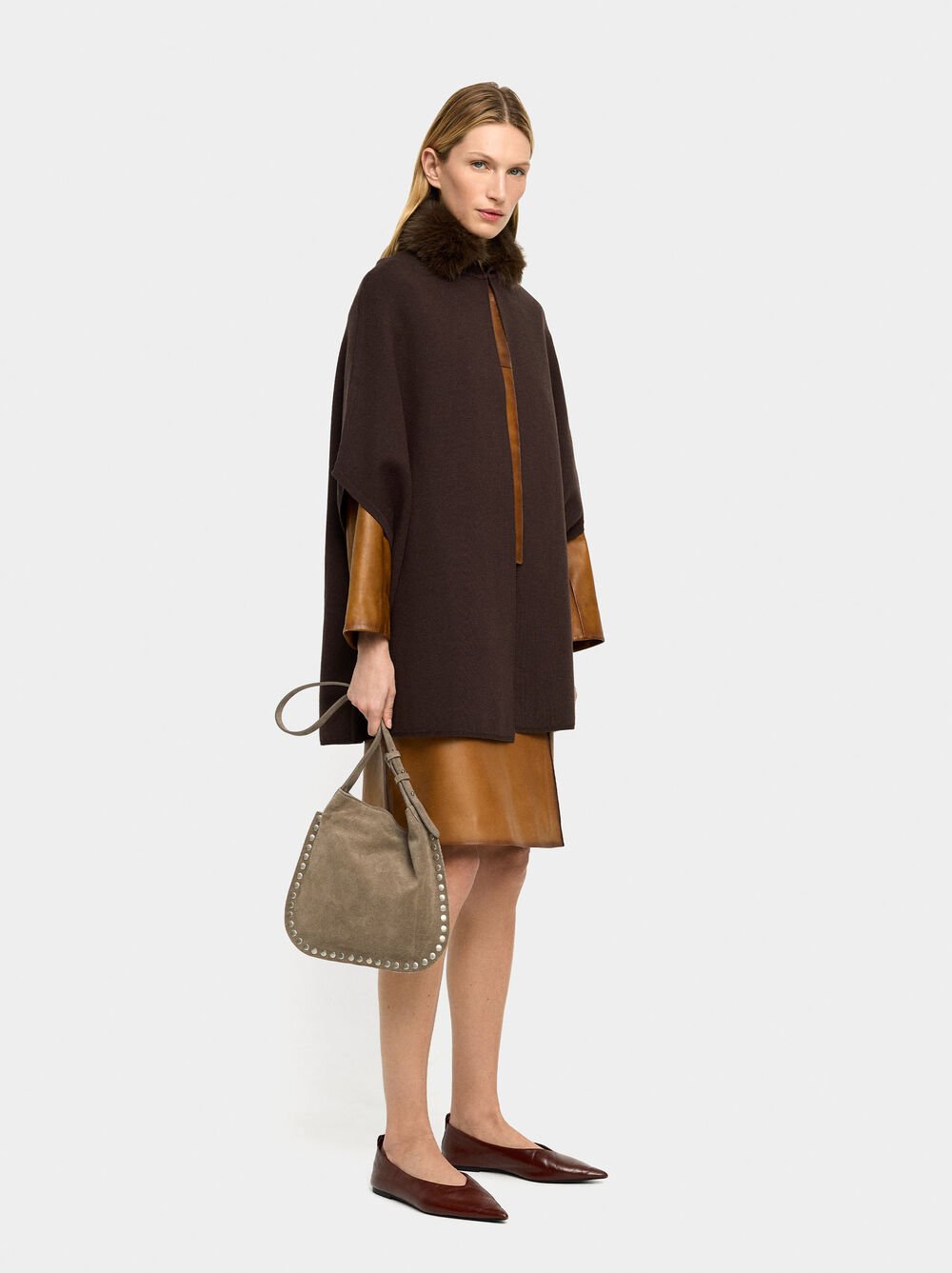 Knit poncho with fur-effect collar