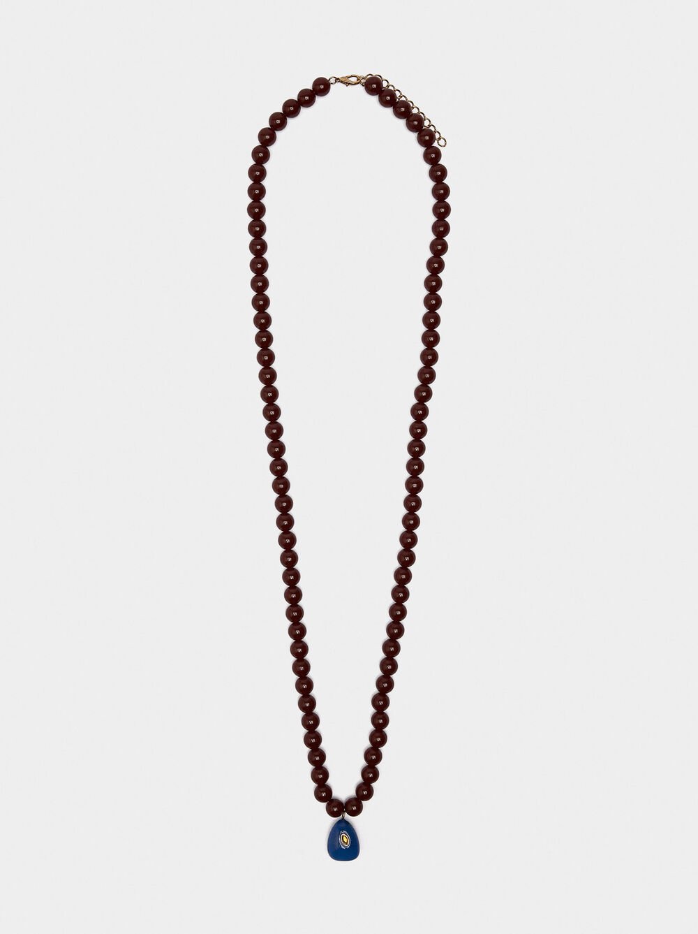 Collier court en perles avec pendentif