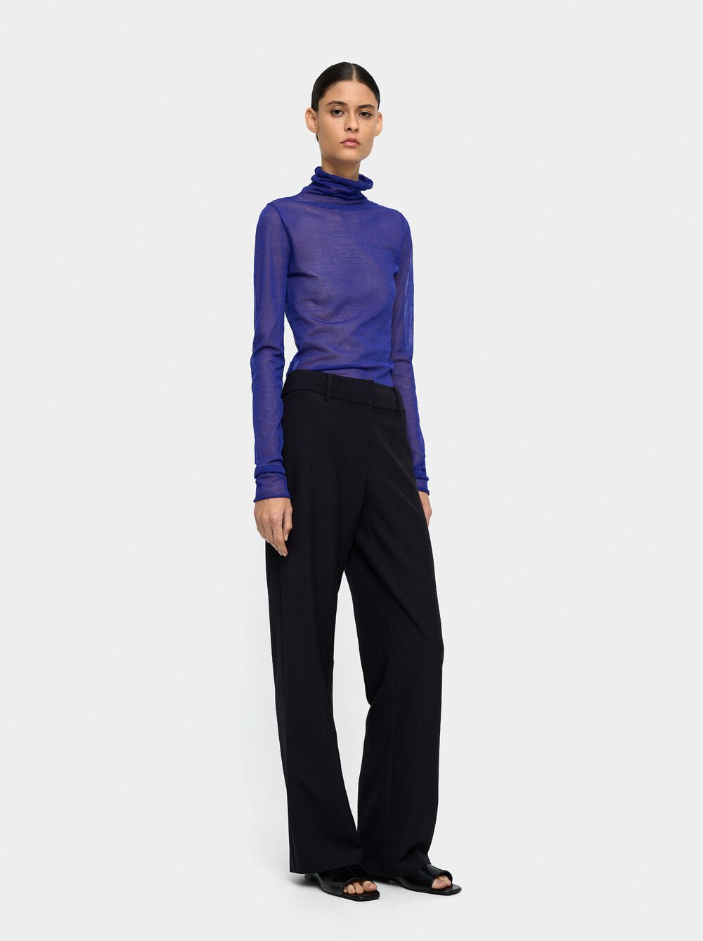 Straight trousers with mid-rise waist