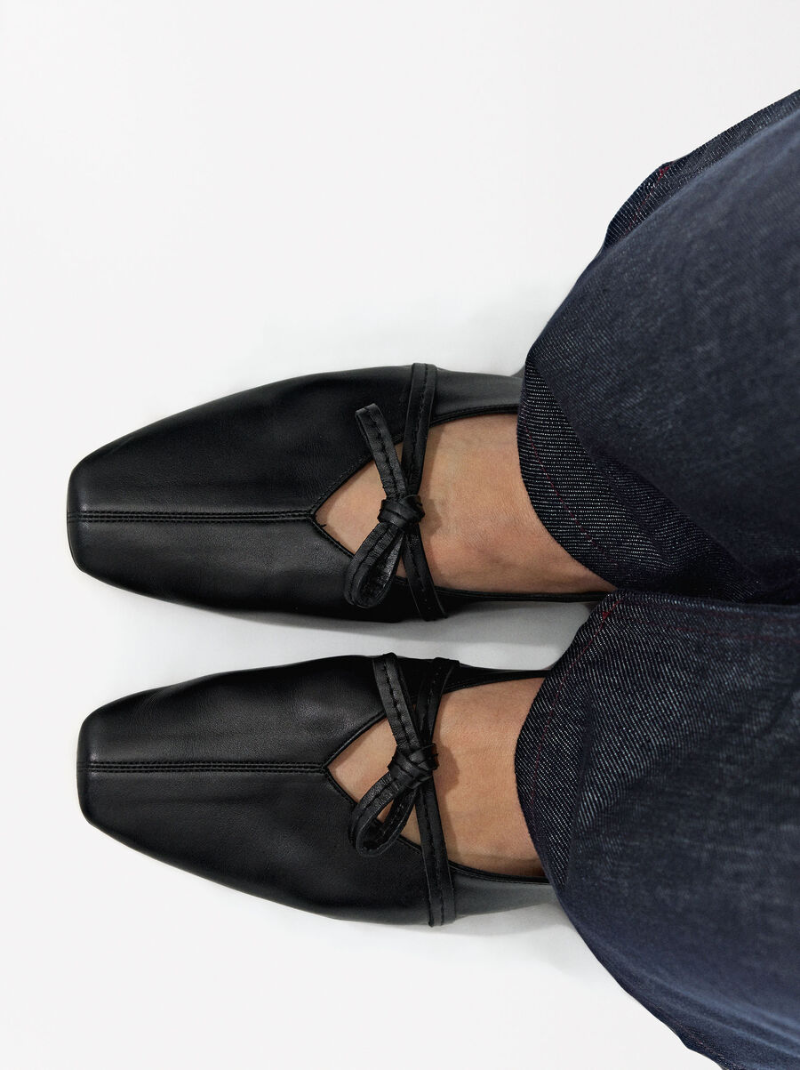 Leather ballet flats with bow