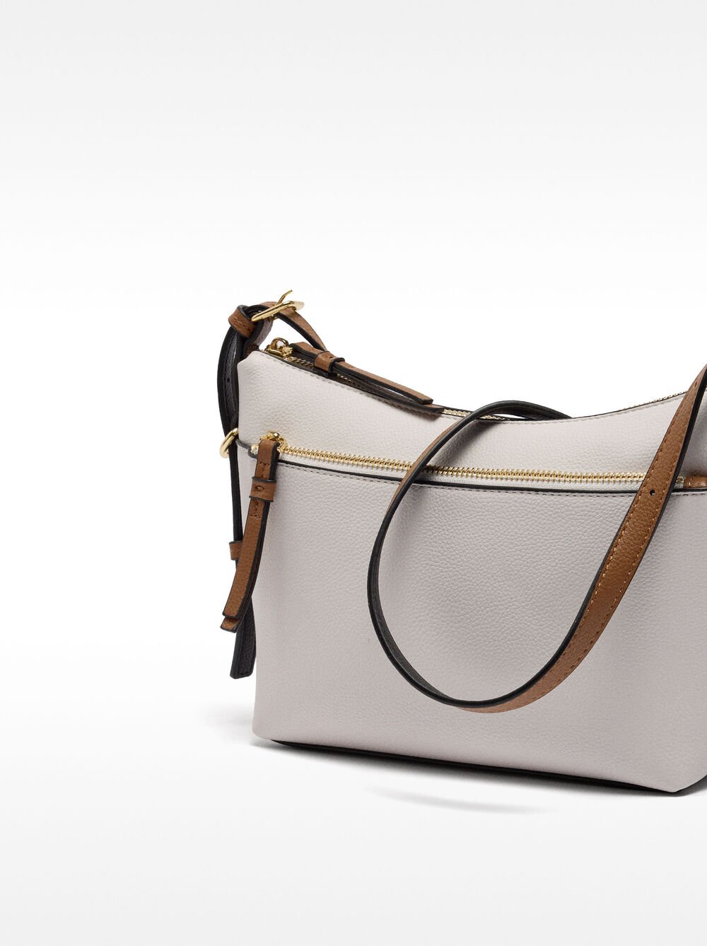 Crossbody bag with exterior pocket