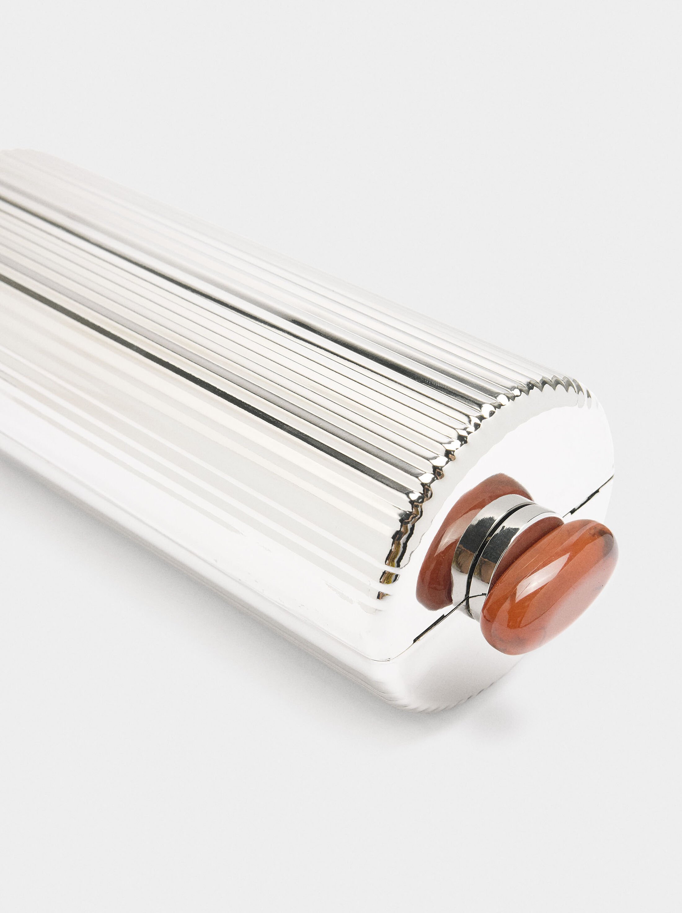 Cylindrical metal clutch image number 1.0