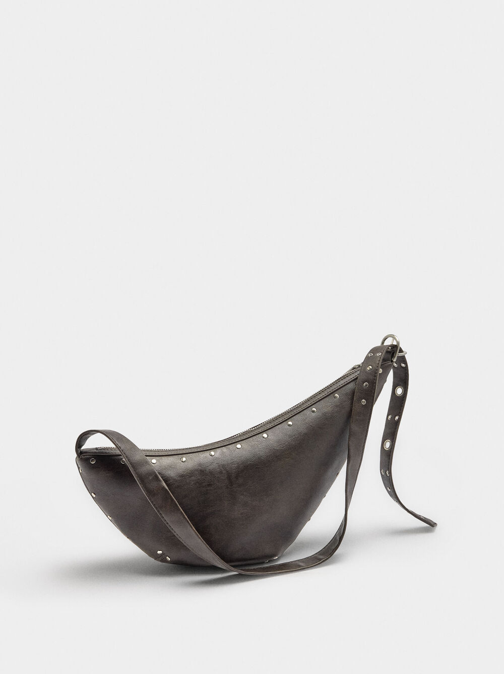 Asymmetric shoulder bag with studs